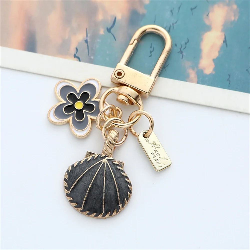 Accessoire pour sac à main - Pendentif fleur de cerisier en émail